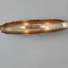 Oumaumau Sconce