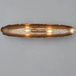 Oumaumau Sconce