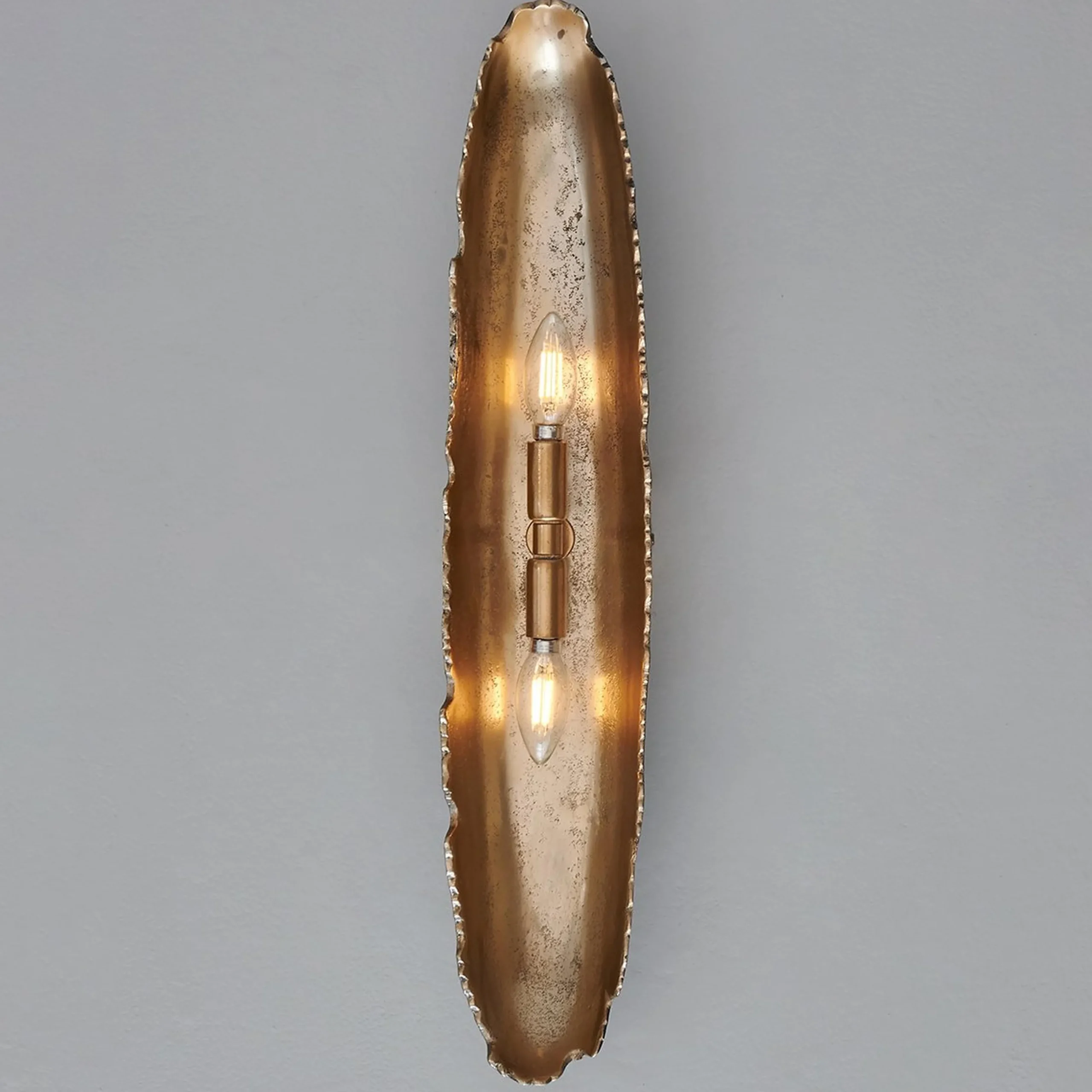 Oumaumau Sconce