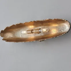 Oumaumau Sconce
